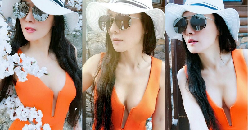 【蜗牛娱乐】福利放送！冬泳第一美女大開中路賞花…那「兩粒」放嘴邊網友全看傻